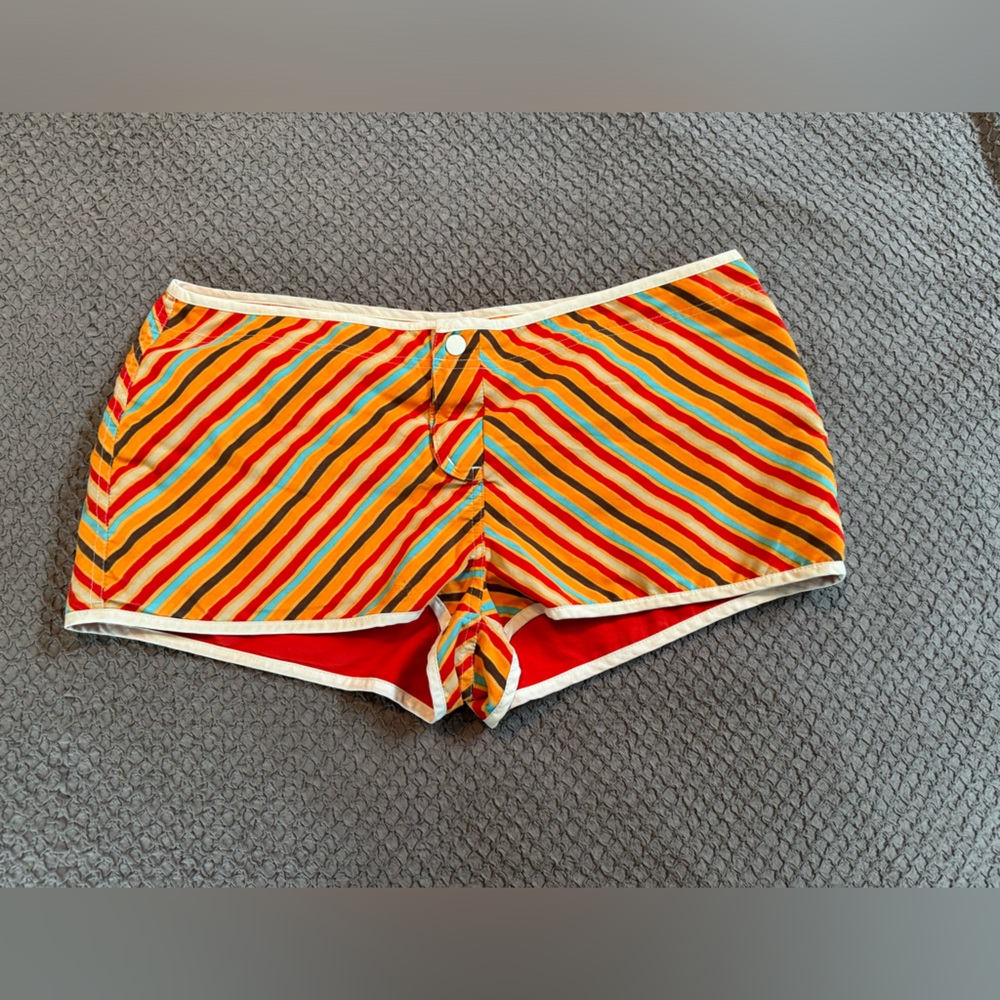 Reversible fun colored board shorts.